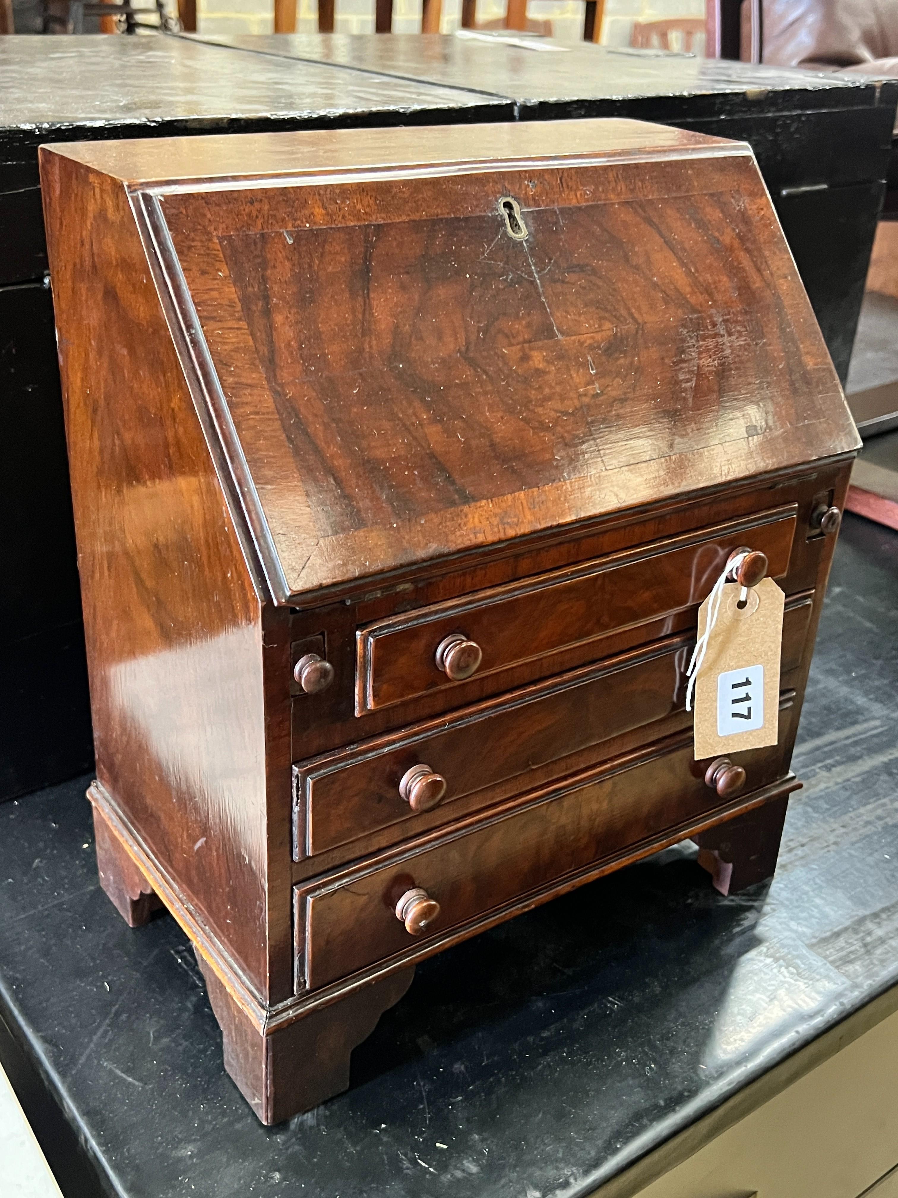 A miniature George III style banded mahogany bureau, width 31cm, depth 19cm, height 36cm